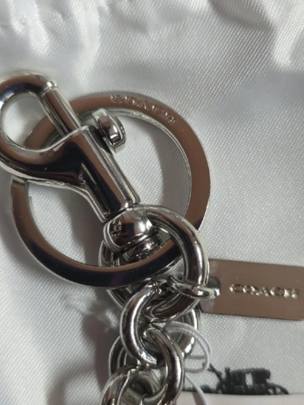 The official Rose Gold Coach 3D Mascot Bear Bag Charm & Keychain